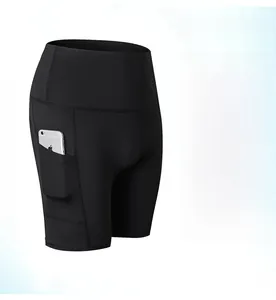 Detail view of high waist yoga shorts with side pocket for phone and elastic fabric