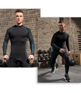 Detail of men's compression set featuring blue contrast stitching and high-stretch fabric