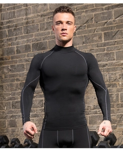 Close-up of men's compression suit with grey stitching for muscle support in gym