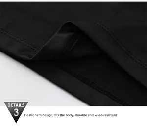 Close-up of durable double-stitched hem on black compression sports shirt for men