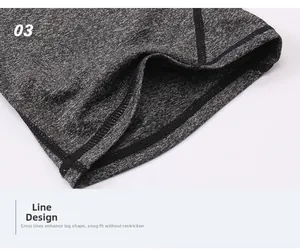 Dettaglio degli shorts yoga grigi con design a linee incrociate e cuciture piatte