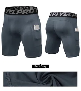 Dettagli dei pantaloncini a compressione grigi da uomo con tasca laterale e elastico in vita