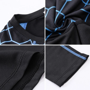 Detail of flatlock stitching and blue spiderweb pattern on men's compression shirt