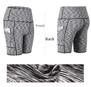 Detail of high waisted space dye yoga shorts featuring functional side phone pockets
