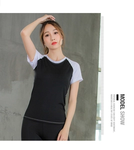 Detail of color-block quick-dry yoga t-shirt with raglan sleeves for fitness and running