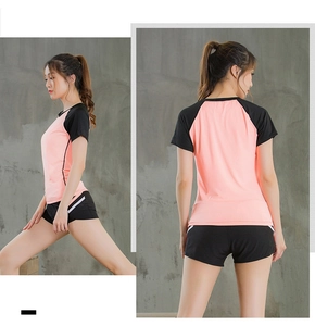 Detailed side and back view of pink and black color-block women's yoga set