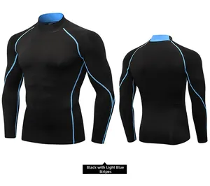 Front and back view of men's compression shirt with black fabric and light blue stitching