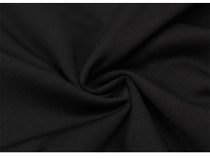 Dettaglio macro del tessuto twill nero traspirante per i pantaloncini fitness pro uomo