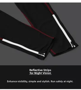 Detail of men's sports pants with reflective strip, red stitching and ankle zipper