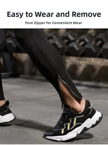 Detail shot of the adjustable ankle zipper on men's compression pants for easy wearing