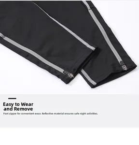 Detail of running pants featuring ankle zipper cuffs and reflective safety strips
