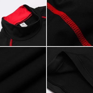 Detail of red stitching on black athletic shirt with elastic quick-dry fabric and size tag