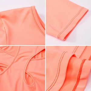 Haut de yoga orange corail pour femme avec dos croisé et tissu à séchage rapide