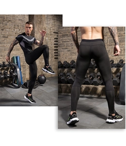 Detailed view of men's compression base layer set for running and gym training workouts