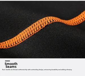 Close-up of flatlock seams with orange contrast stitching on black fitness t-shirt
