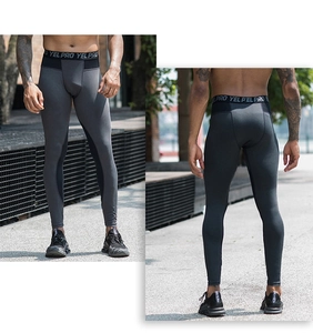 Macro view of men's PRO compression leggings with elastic YEL PRO waistband and mesh panels