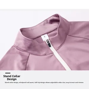 Detail of mauve stand collar with white half-zipper and size S tag on sports top