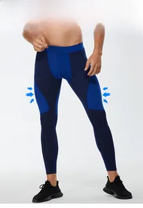 Detail of men's compression leggings showing blue color-block design and muscle support fit