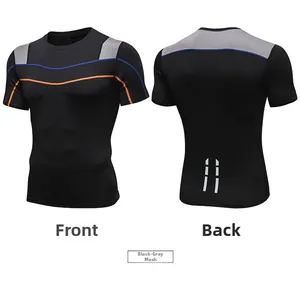 Macro view of men's athletic compression tee showing reflective strips and mesh detail