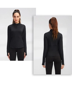 Detailed front and back view of black slim-fit workout top with thumb holes and half-zip