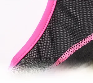 Close-up of pink and black contrast stitching with breathable mesh fabric on sports vest