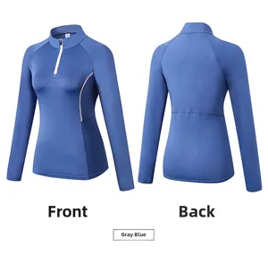 Front and back view of a grey blue slim fit athletic long sleeve top with half zipper