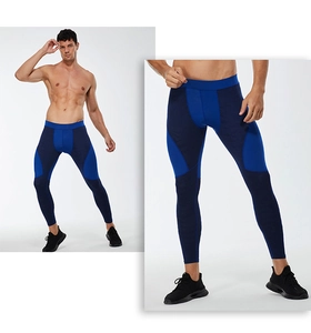 Close-up of navy and bright blue athletic compression pants with elastic waistband