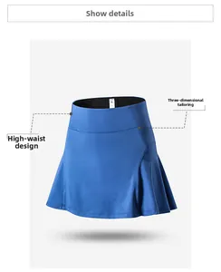 Macro detail of high-waisted navy tennis skirt showing premium stitching and size label