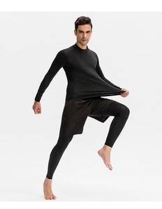Détail de l'ensemble de compression noir pour homme en tissu extensible à séchage rapide