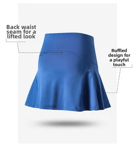 Detail view of high-waist royal blue tennis skirt featuring ruffled hem and lifting back seam