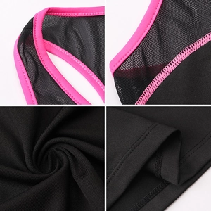 Detail of mesh panel and pink piping on black high-stretch breathable yoga vest
