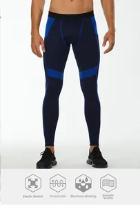 Detail of men's blue compression pants featuring flat seams and ergonomic stitching