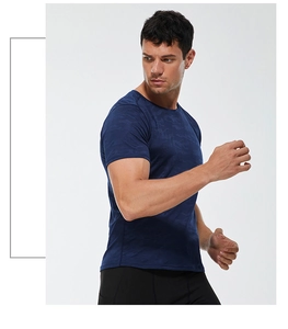Men's navy blue quick-dry camo t-shirt close-up showing breathable fabric texture