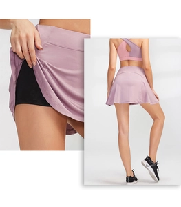 Detail of light purple pleated sports skirt with integrated black inner liner shorts