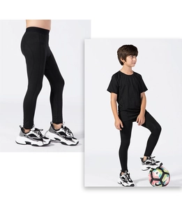 Close-up of boys sports compression pants and short sleeve set for athletic training