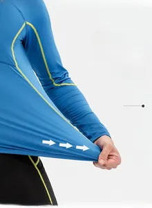 Close-up of blue compression shirt showing highly elastic fabric and durable stitching