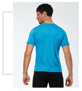 Detail of men's quick-dry sports t-shirt showing blue camouflage texture and breathable fabric