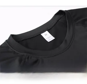 Detailed view of black athletic shirt collar with double stitching and wash label info