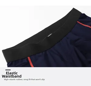 Détail du pantalon de compression pour hommes avec ceinture élastique et coutures rouges