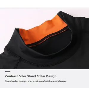 Détail du col montant avec doublure orange contrastée sur haut de sport pour homme