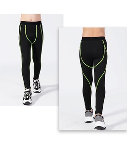Detail of kids compression leggings showing contrast stitching and high-elastic fabric