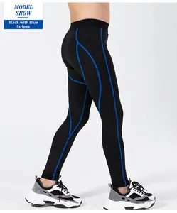 Detail view of boys athletic compression leggings with blue flatlock stitching