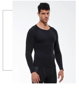 Detail of men's quick-dry compression long sleeve top with ergonomic raglan sleeves