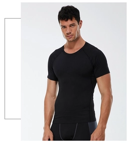 Detail of black quick-dry compression shirt for men, high elasticity and raglan sleeve design