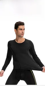 Detail of men's compression sports set with high-elastic fabric and yellow stitching