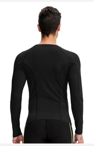 Detail view of men's black compression shirt showing seamless stitching and ergonomic design