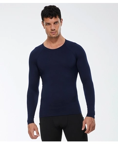 Detailed view of dark blue long-sleeve compression shirt with athletic fit and crew neck