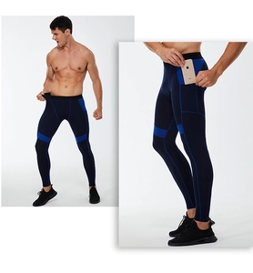 Detail shot of men's compression pants with functional side pocket for mobile phone