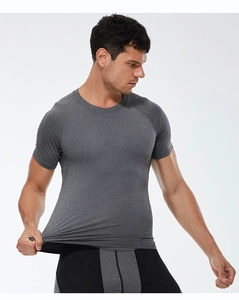 Close-up of men's quick-dry sports t-shirt showing 4-way stretch fabric and raglan sleeves