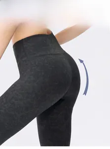 Detail of high-waist marble print yoga pants showing lifting and body shaping effect